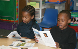 Boys reading Bell's books